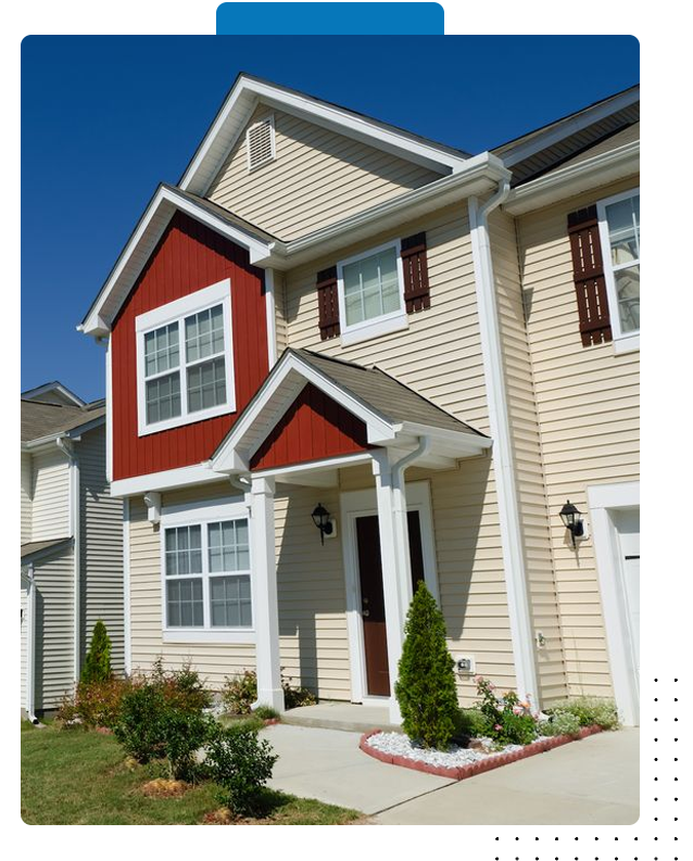 a house with red paint on the front